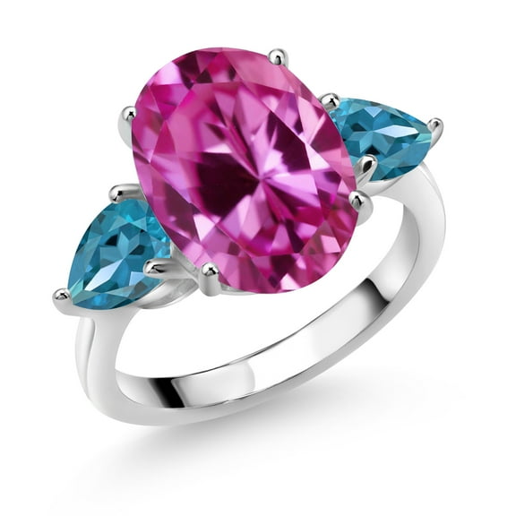 Gem Stone King 925 Sterling Silver Pink Created Sapphire and London Blue Topaz Ring for Women (7.54 Cttw, 14X10MM Oval and 7X5MM Pear Shape, Gemstone September Birthstone, Size 6)
