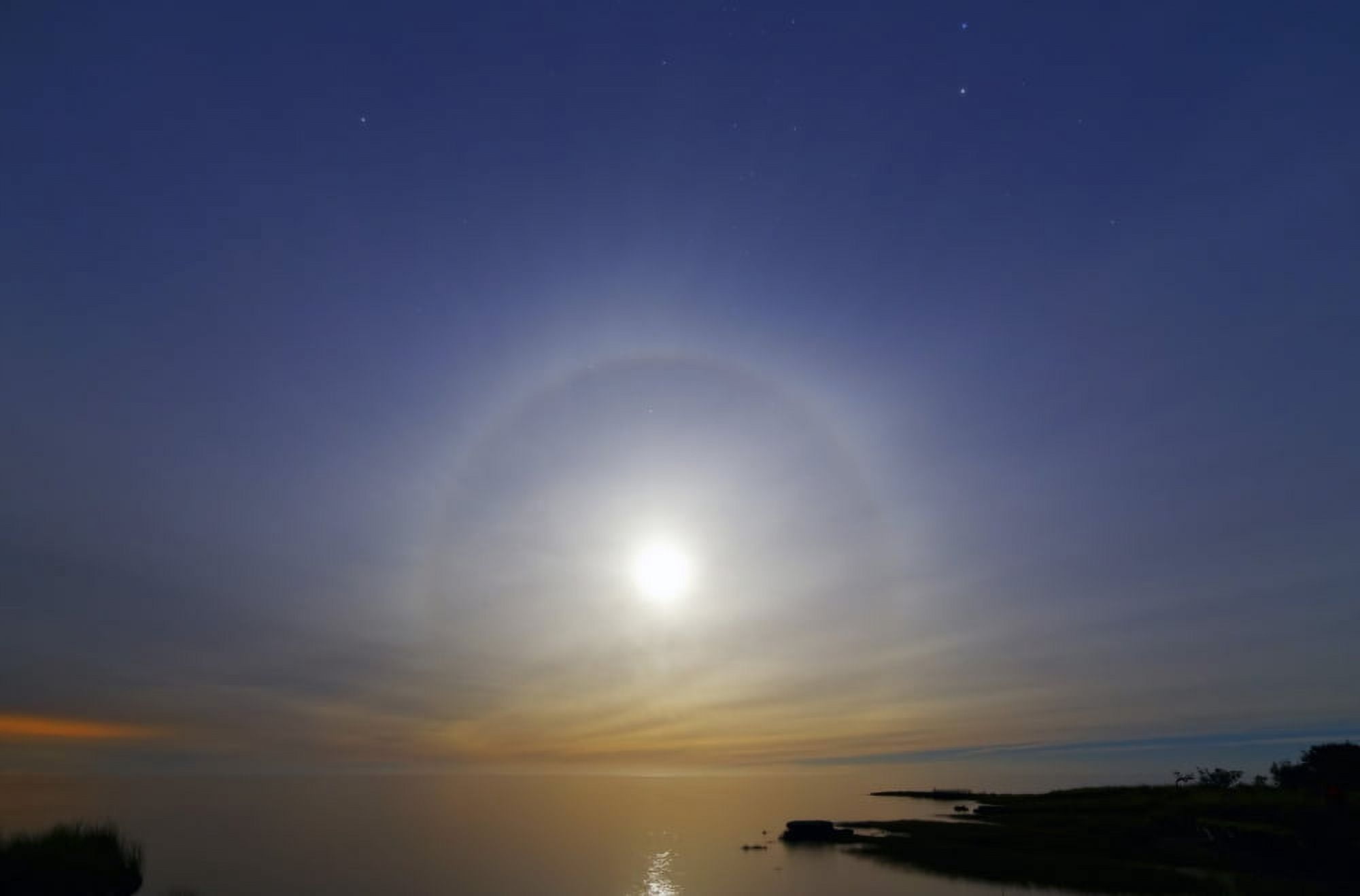 A 22 degrees halo around the 2013 supermoon Canvas Art - Luis ArgerichStocktrek Images (35 x 23)