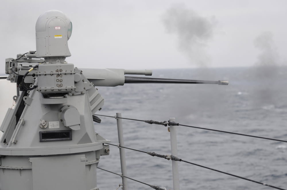 A 25mm machine gun is fired aboard USS Blue Ridge Canvas Art - Stocktrek Images (35 x 23)