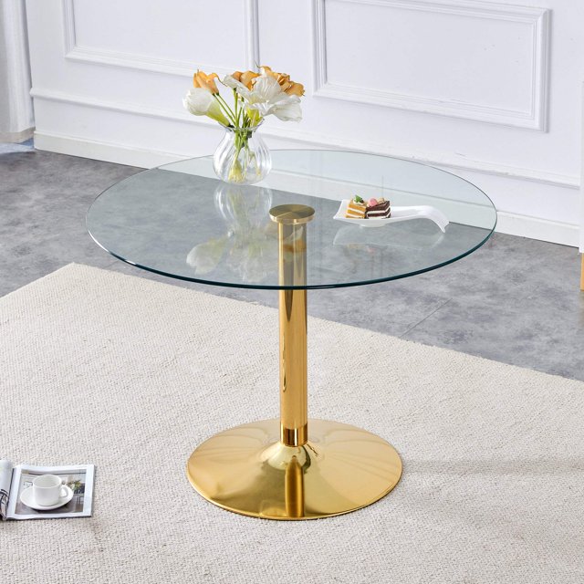 A 42 Inch Diameter Glass Top And A Modern, Minimalist Round Dining