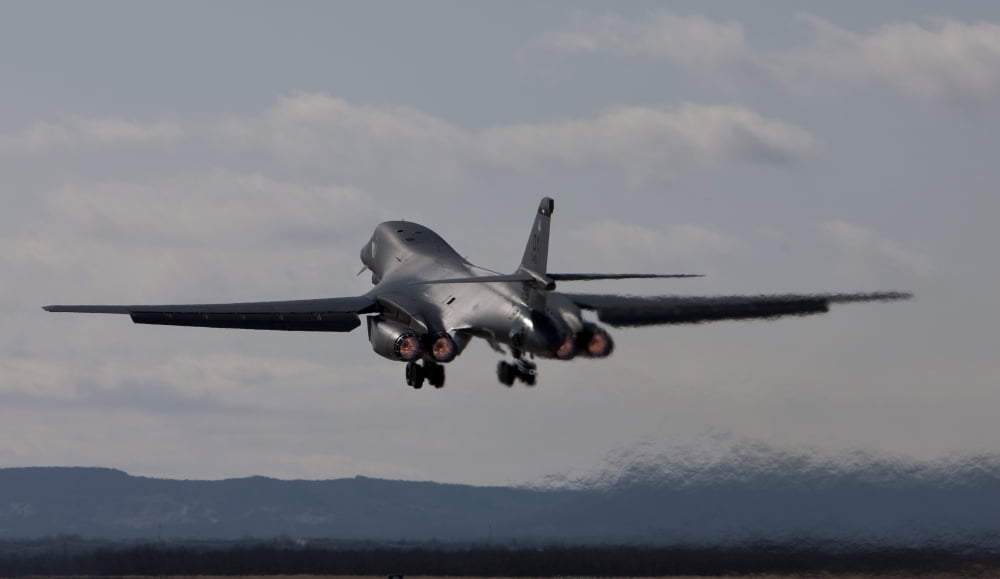 A B-1B Lancer takes off from Dyess Air Force Base Texas Canvas Art - HIGH-G ProductionsStocktrek Images (37 x 22)
