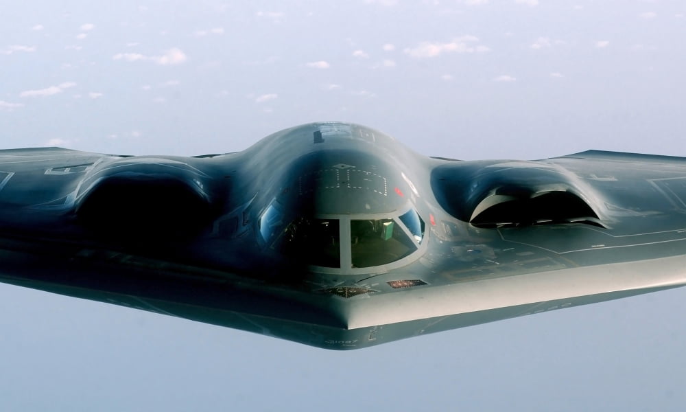 A B-2 Spirit takes on fuel from a KC-135 Stratotanker Canvas Art - Stocktrek Images (36 x 22)