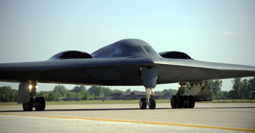A B-2 Spirit taxis onto the flightline at Whiteman Air Force Base Missouri Canvas Art - Stocktrek Images (39 x 20)