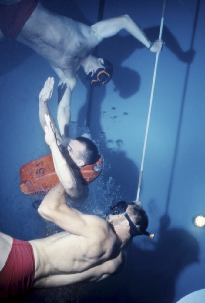 A BUDS 2nd phase student ascends rapidly during 50-foot buoyant ascent training Canvas Art - Michael WoodStocktrek Images (12 x 18)