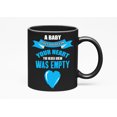 thumbnail image 1 of A Baby Fills a Place in Your Heart, Black 11oz Ceramic Mug, 1 of 5
