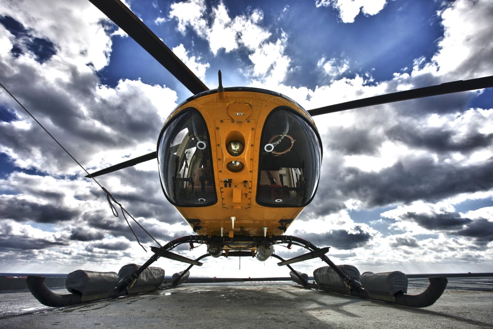 A Bell 407 utility helicopter on the helipad of an oil rig Canvas Art - Terry MooreStocktrek Images (35 x 24)