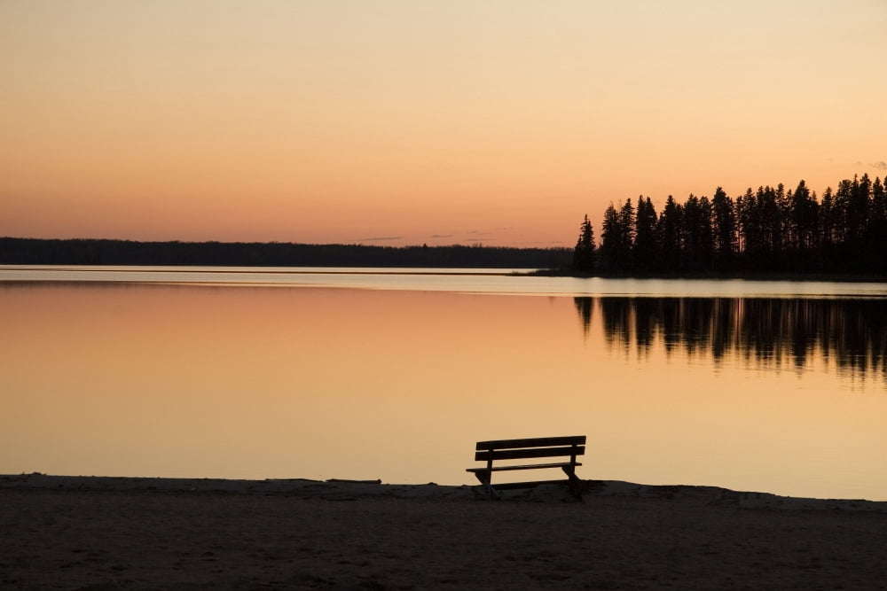 A Bench Silhouetted At Sunset Near The Lake Canvas Art - Eryk Jaegermann Design Pics (34 x 22)