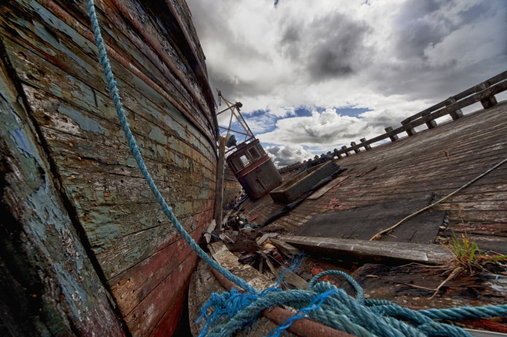A Blue Rope Tied To An Old Weathered Wooden Boat On A Wooden Dock Salem Isle Of Mull Scotland Canvas Art - John Short  Design Pics (19 x 12)