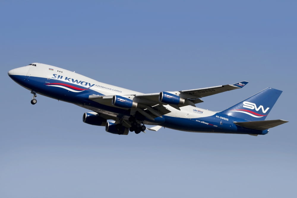 A Boeing 747-400 of Slik Way Airlines in flight over Italy Canvas Art - Luca NicolottiStocktrek Images (35 x 23)