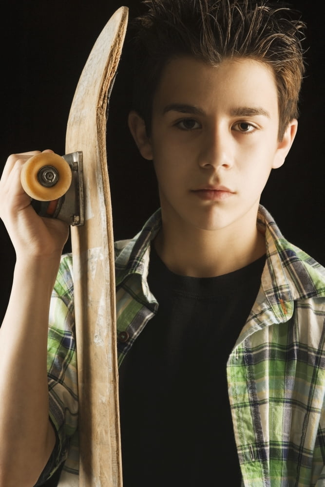 A Boy With A Skateboard Canvas Art - Darren Greenwood Design Pics (12 x 19)