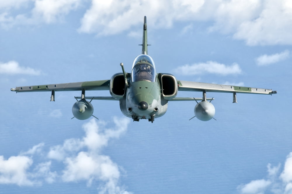 A Brazilian Air Force Embraer A-1B soars through the sky over Brazil Canvas Art - Giovanni CollaStocktrek Images (35 x 24)