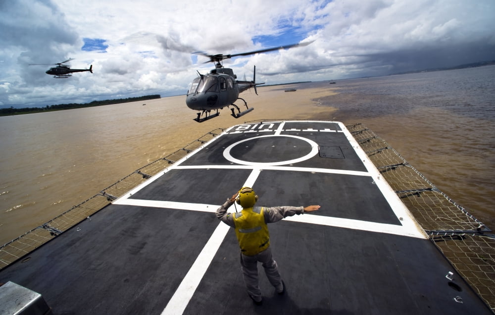 A Brazilian Eurocopter prepares to land aboard a Brazilian navy hospital ship Canvas Art - Stocktrek Images (35 x 23)