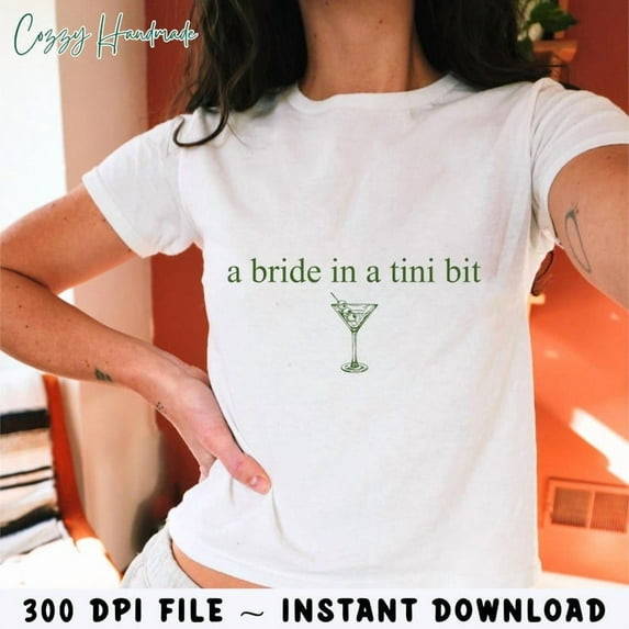 A Bride in a Tiny Bit Bride T-Shirt Dirty Martini Bachelorette Party Shirt - Martini Bride Funny Themed Gift for Bachelorette Celebration