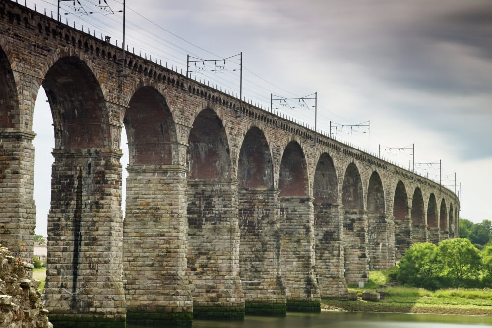 A Bridge With Arches And Power Lines On Top Berwick Northumberland England Canvas Art - John Short Design Pics (38 x 24)