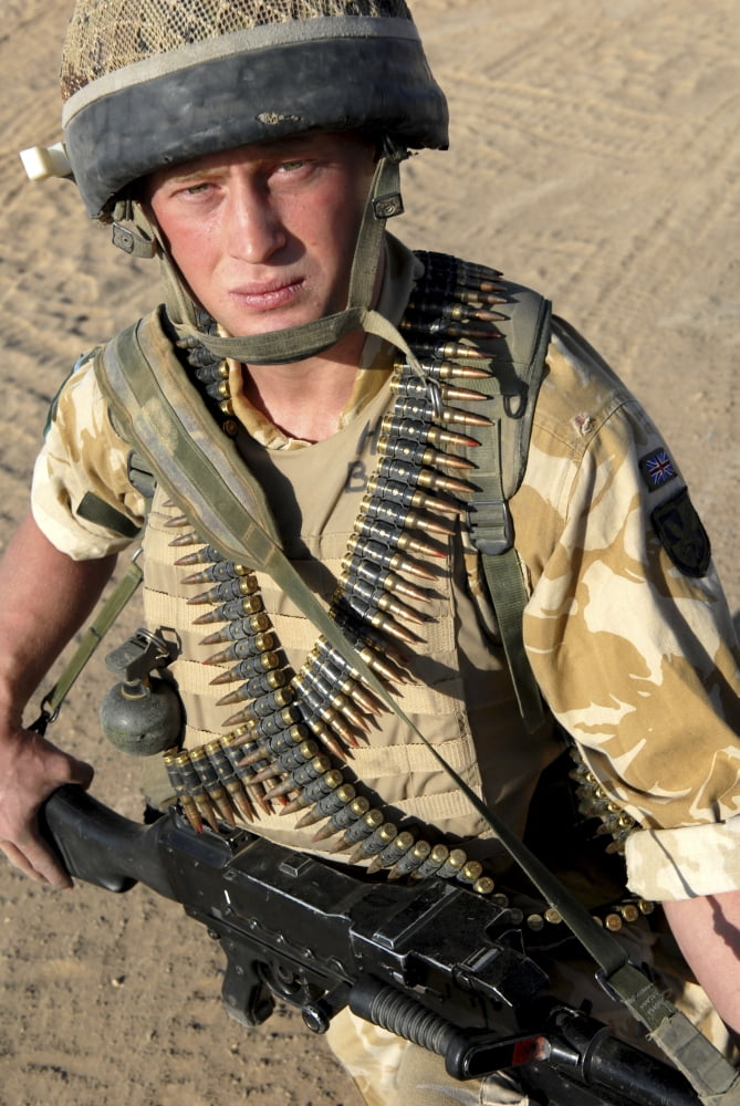 A British Army soldier equipped with a machine gun and ammunition Canvas Art - Andrew ChittockStocktrek Images (23 x 34)