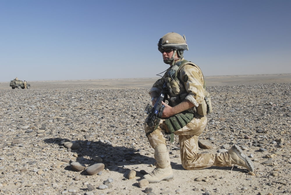 A British Army soldier on a foot patrol in Afghanistan Canvas Art - Andrew ChittockStocktrek Images (34 x 23)