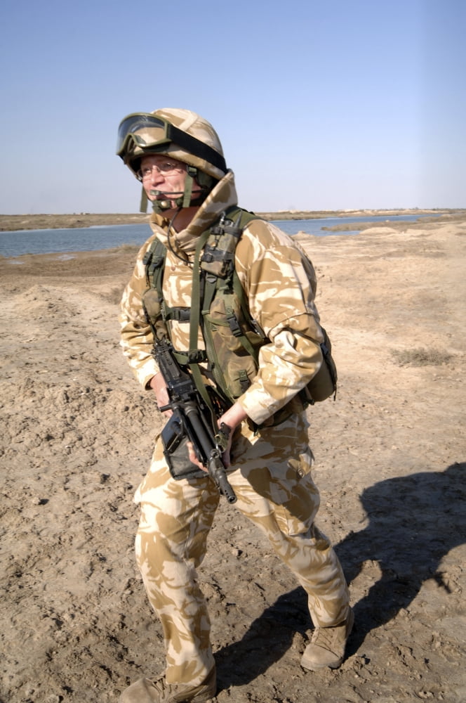 A British Army soldier on patrol in Iraq Canvas Art - Andrew ChittockStocktrek Images (23 x 34)