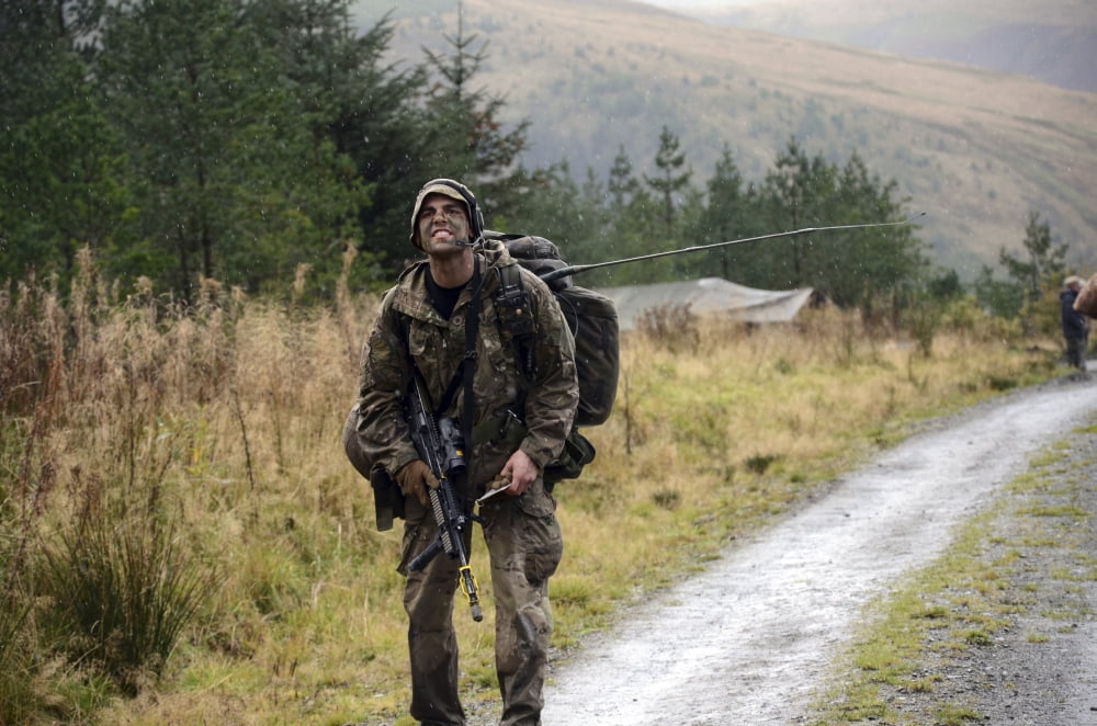 A British soldier with radio during Exercise Cambrian Patrol 2011 Canvas Art - Andrew ChittockStocktrek Images (35 x 23)