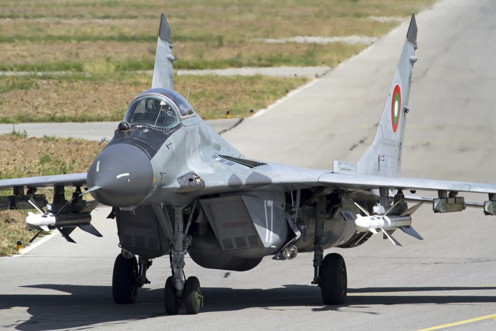 A Bulgarian Air Force MiG-29 equipped with AA-10 Alamo missiles Canvas Art - Anton BalakchievStocktrek Images (18 x 12)