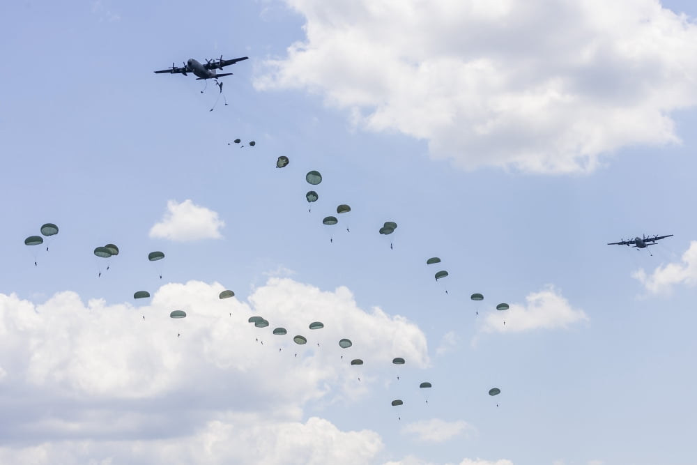 A C-130 Hercules drop US Army airborne troops over Maryland Canvas Art - Rob EdgcumbeStocktrek Images (17 x 12)