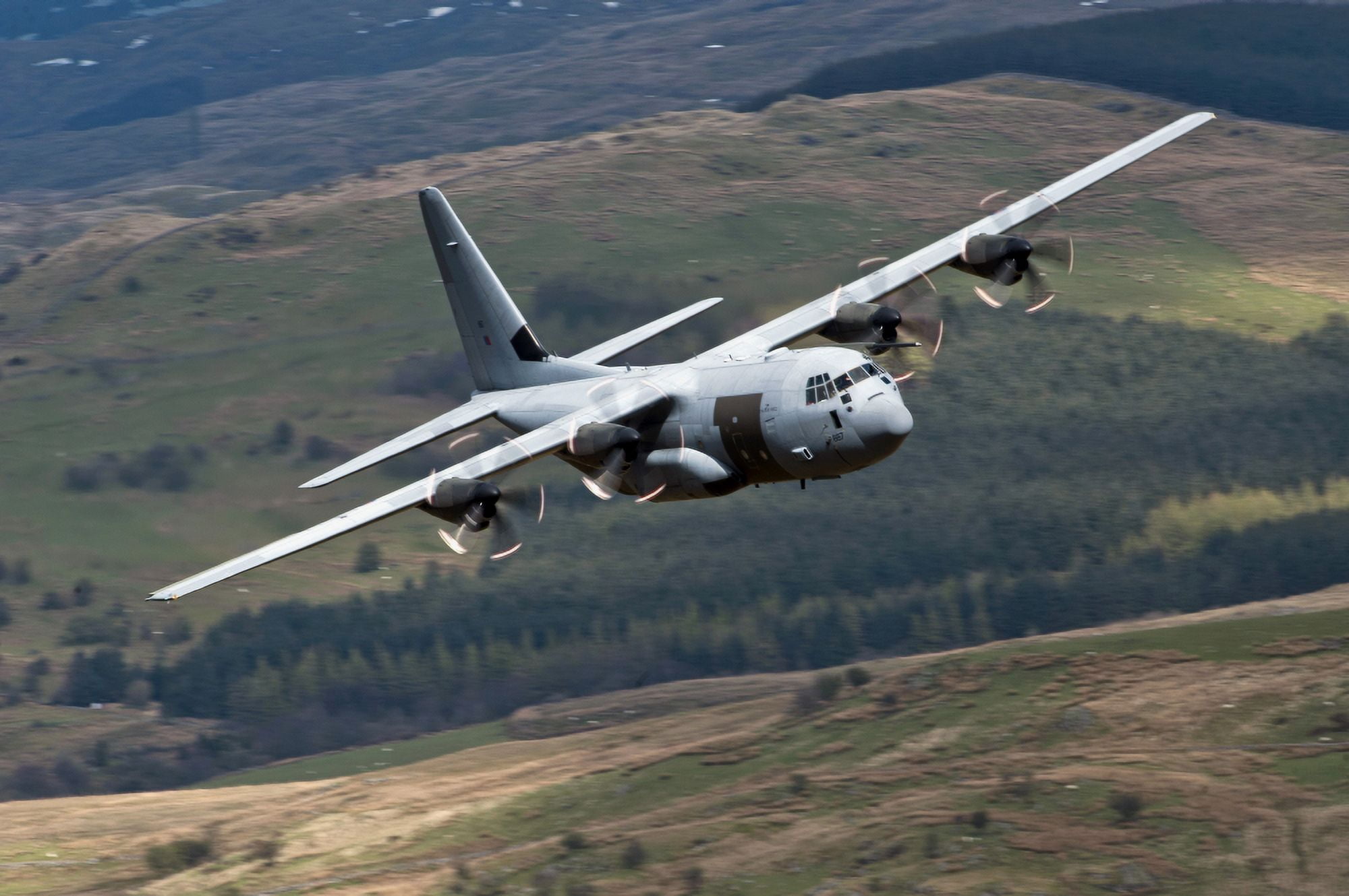 A C-130 Hercules of the Royal Air Force flying over North Wales Canvas Art - Andrew ChittockStocktrek Images (35 x 23)