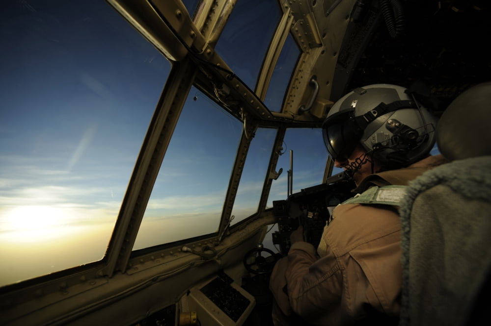 A C-130 Hercules pilot scans the horizon Canvas Art - Stocktrek Images (34 x 23)