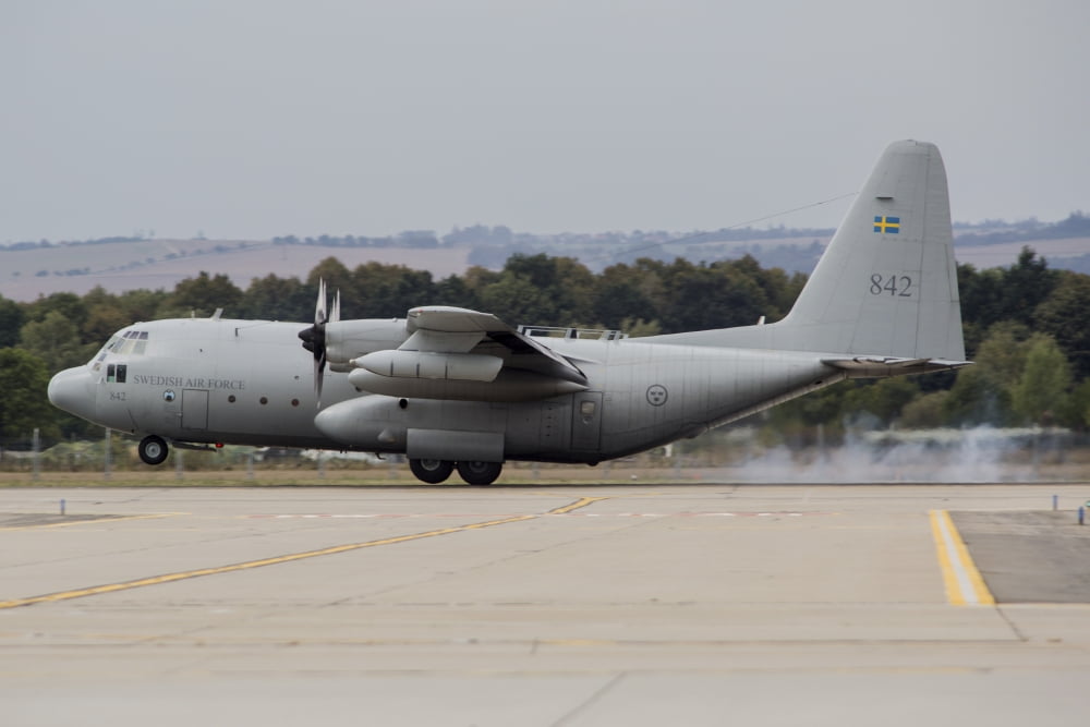 A C-130E Hercules of the Swedish Air Force landing in Ostrava Czech Republic Canvas Art - Timm ZiegenthalerStocktrek Images (34 x 23)