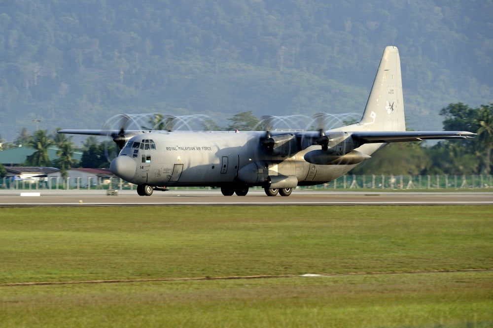 A C-130J Hercules of the Royal Malaysian Air Force prepares to take off Canvas Art - Remo GuidiStocktrek Images (35 x 23)