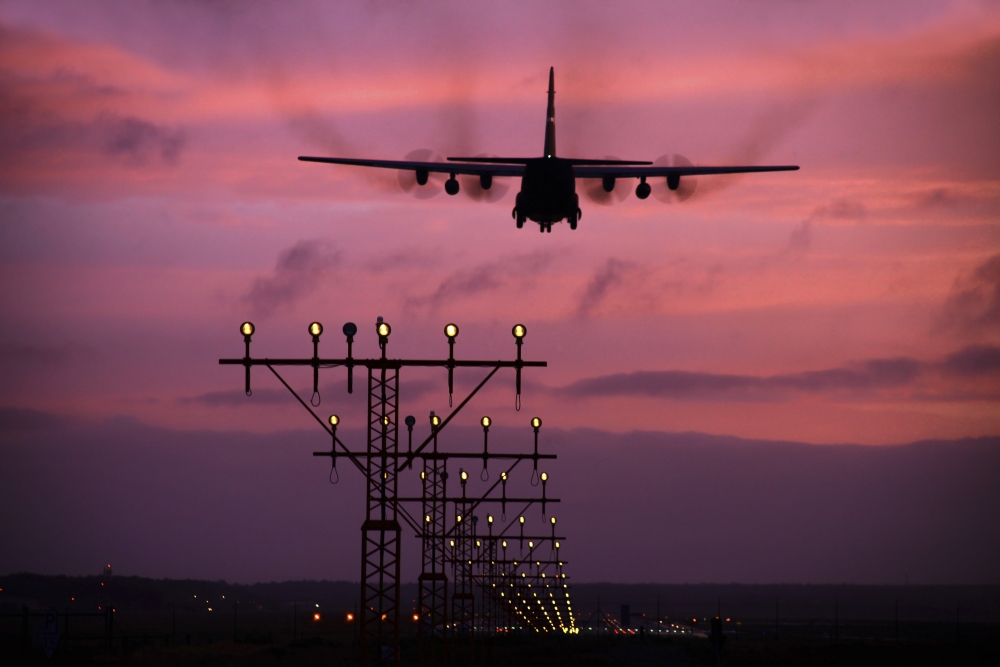 A C-130J Super Hercules landing at Ramstein Air Base Germany Canvas Art - Timm ZiegenthalerStocktrek Images (18 x 12)