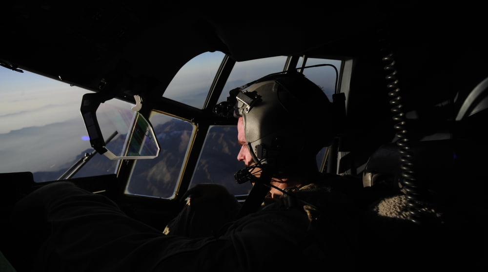 A C-130J Super Hercules pilot in flight during a routine channel mission in Afghanistan Canvas Art - Stocktrek Images (38 x 21)