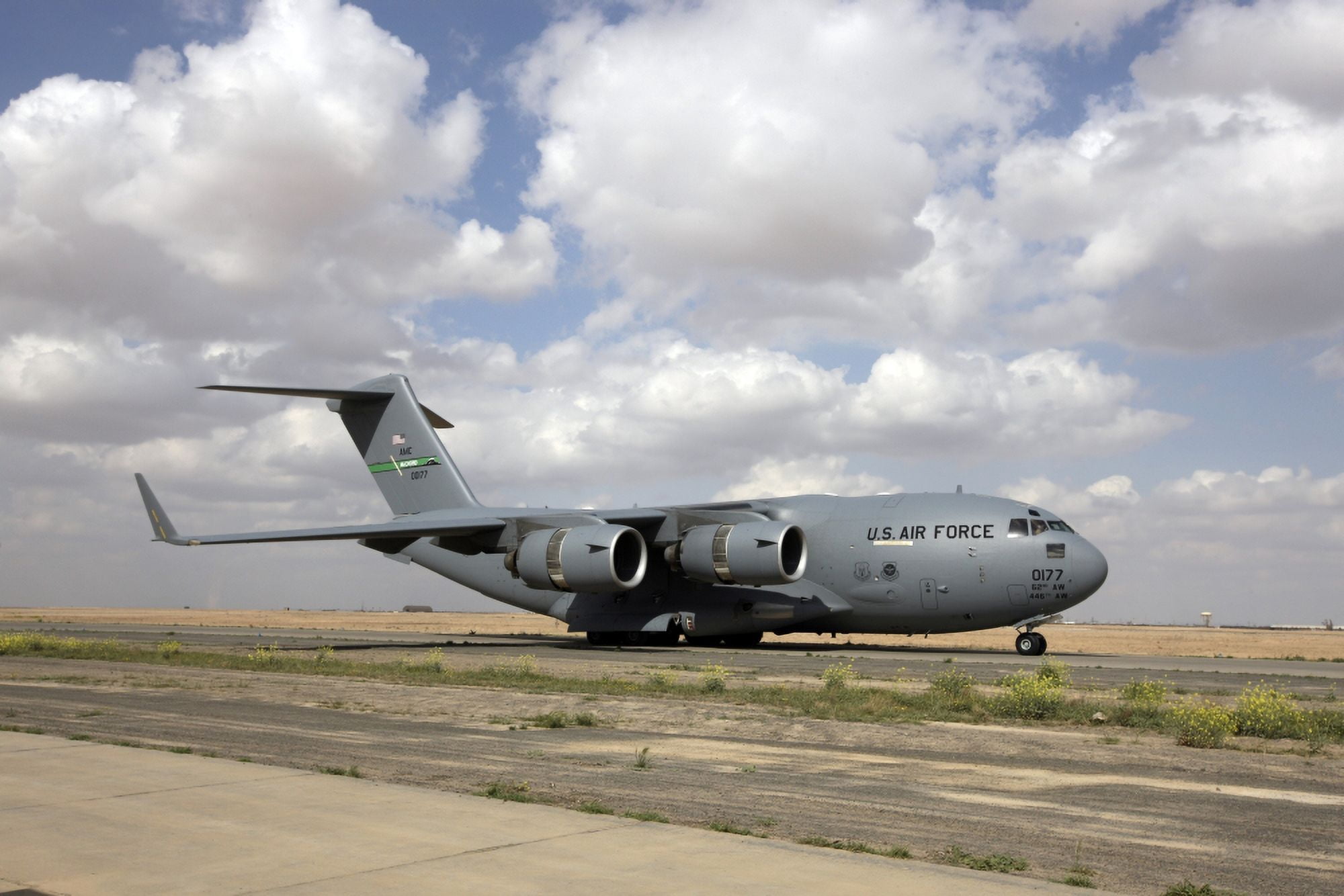 A C-17 Globemaster III on the runway Canvas Art - Terry MooreStocktrek Images (35 x 23)