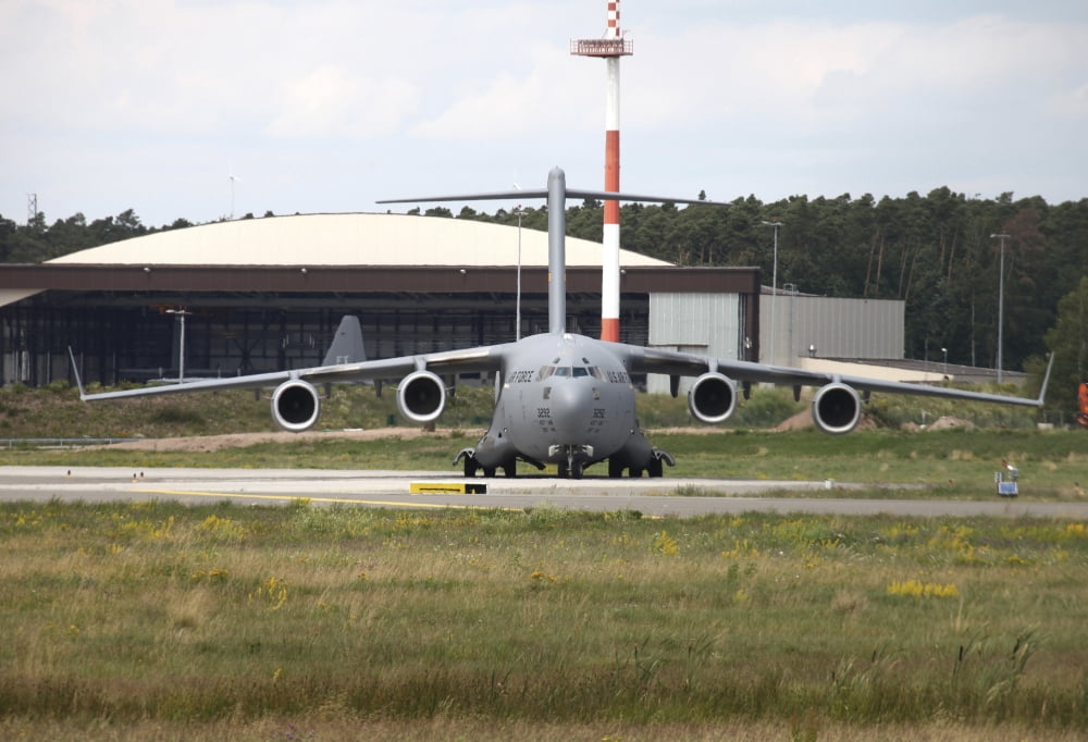 A C-17 Globemaster taxiing at Ramstein Air Base Germany Canvas Art - Timm ZiegenthalerStocktrek Images (18 x 12)