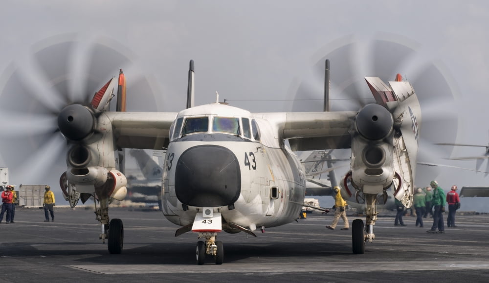 A C-2A Greyhound aboard USS George HW Bush Canvas Art - Giovanni CollaStocktrek Images (19 x 11)
