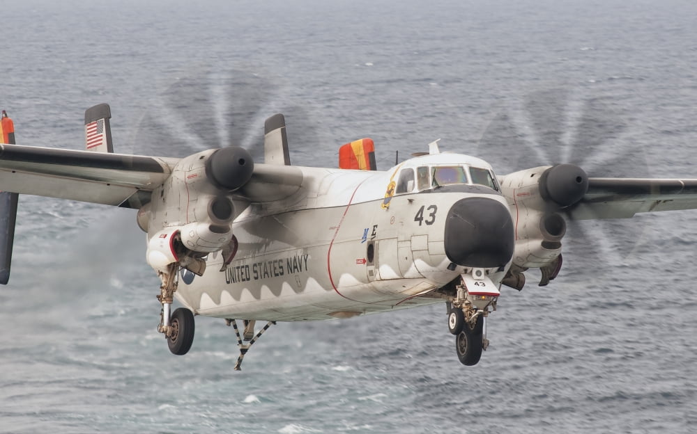 A C-2A Greyhound prepares for landing aboard of USS George HW Bush Canvas Art - Giovanni CollaStocktrek Images (18 x 12)