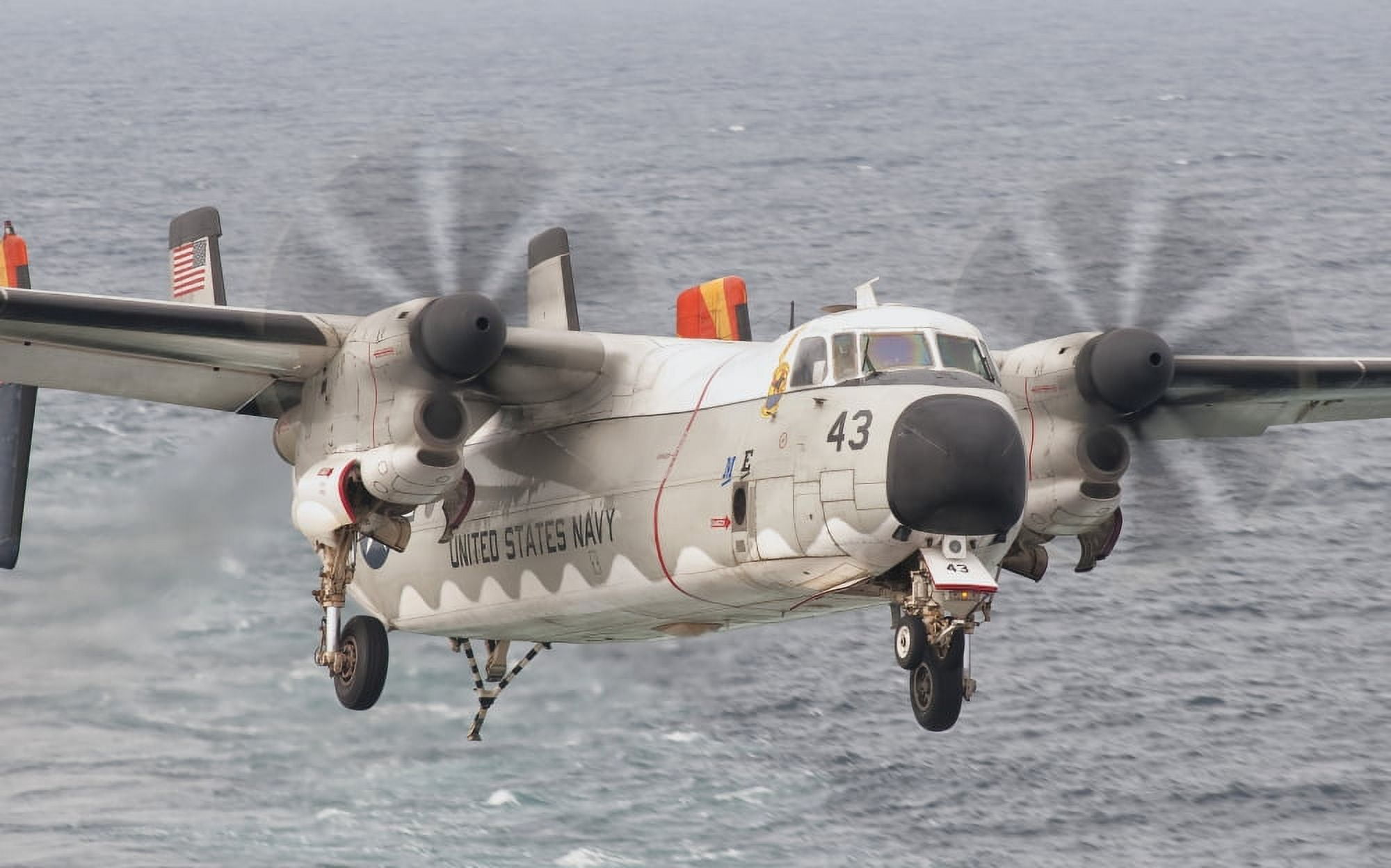A C-2A Greyhound prepares for landing aboard of USS George HW Bush Canvas Art - Giovanni CollaStocktrek Images (36 x 23)