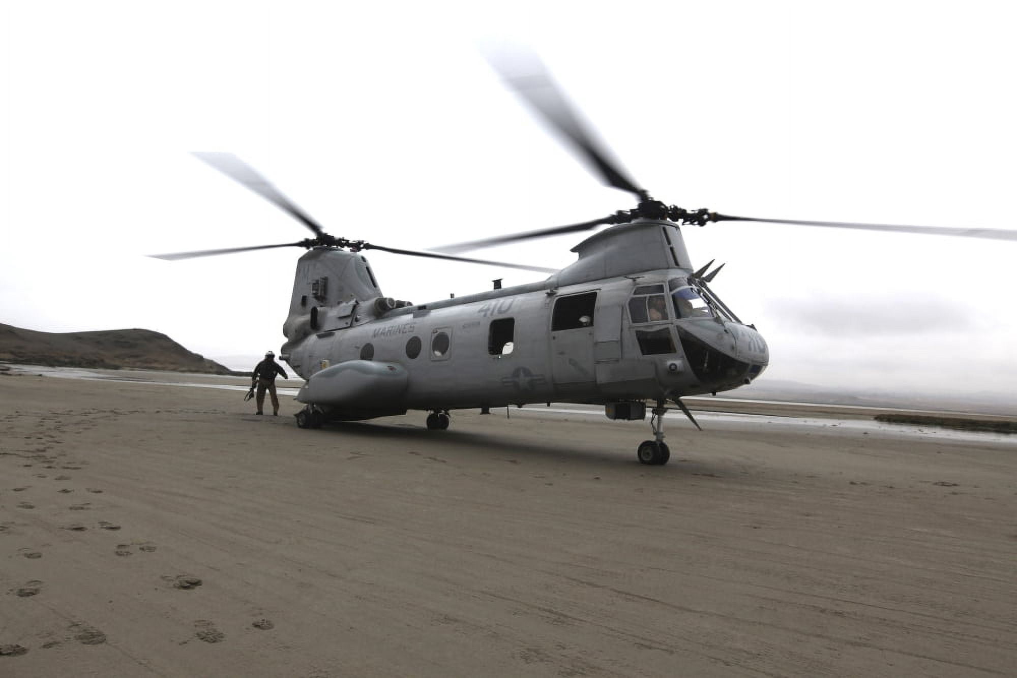 A CH-46 Sea Knight helicopter transports Marines to a beach in Ancon Peru Canvas Art - Stocktrek Images (35 x 23)