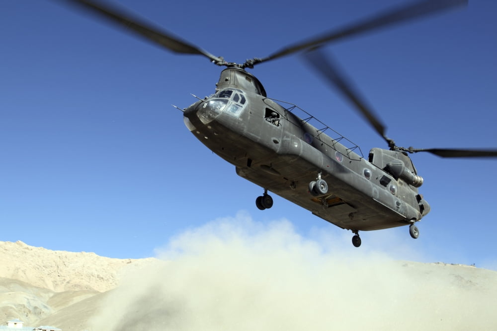 A CH-47 Chinook prepares to land Canvas Art - Stocktrek Images (35 x 23)