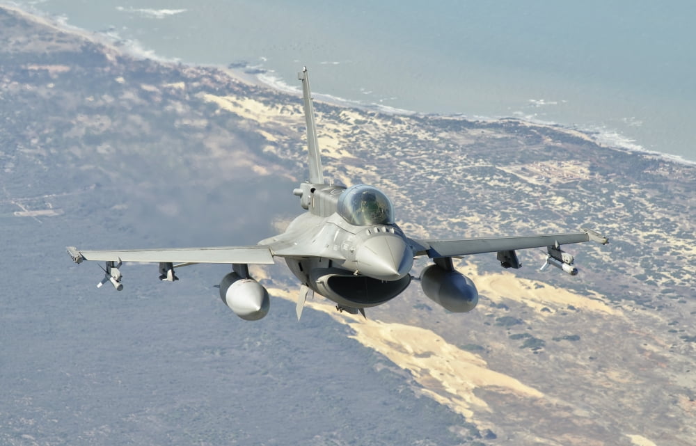 A Chilean Air Force F-6D Block 50 over Brazil Canvas Art - Giovanni CollaStocktrek Images (35 x 23)