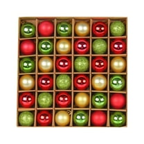 A Christmas Tree Ornament Ball Set With Red Green And Gold Design