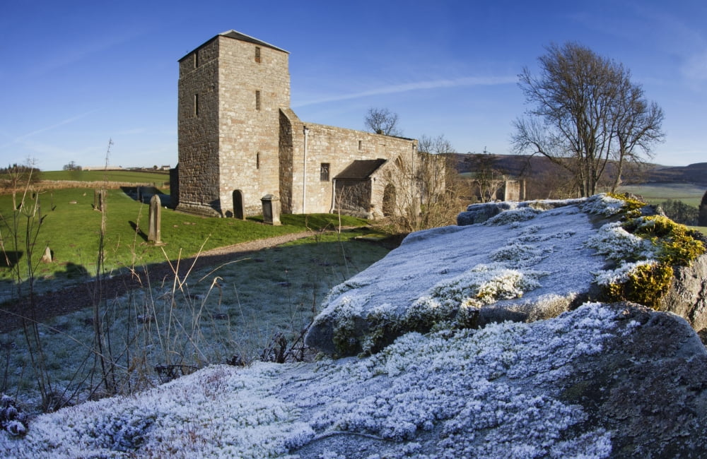 A Church And Cemetery With Frost On The Grass And Stone Wall Eglingham Northumberland England Canvas Art - John Short Design Pics (38 x 24)