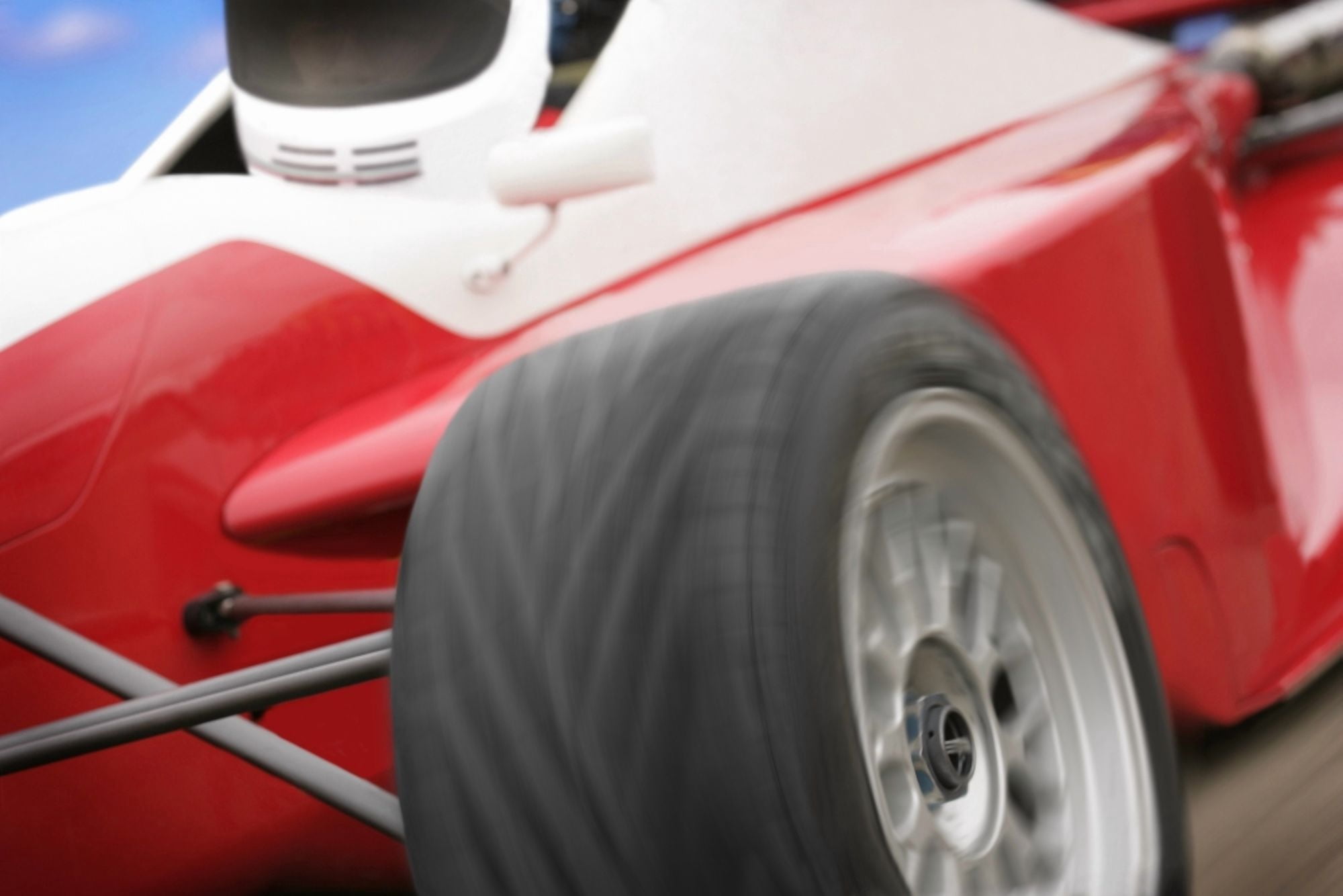 A Close-Up Of A Red Race Car Canvas Art - Don Hammond Design Pics (17 x 11)