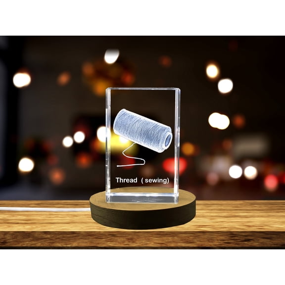 A Coil of Crystal Carved Sewing Thread - A Miniature Tribute to Stitches