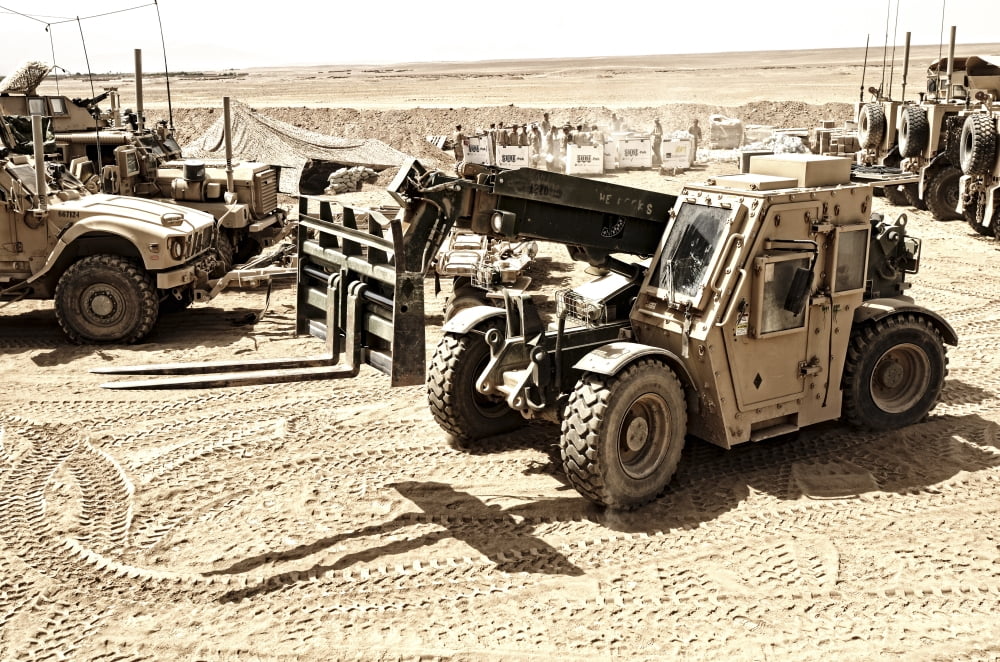 A Combat Logistics Battalion multi-mission vehicle unloads supplies Canvas Art - Stocktrek Images (35 x 23)
