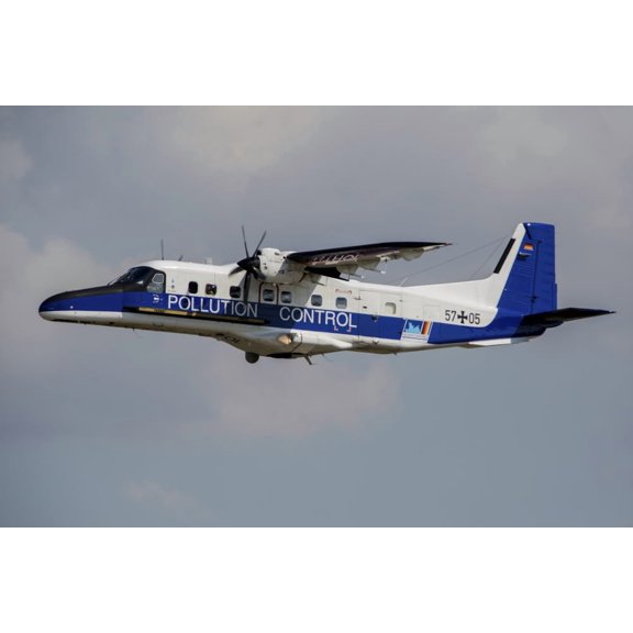 A Dornier Do 228NG of the German Navy used to control oil pollution Canvas Art - Timm ZiegenthalerStocktrek Images (34 x 23)