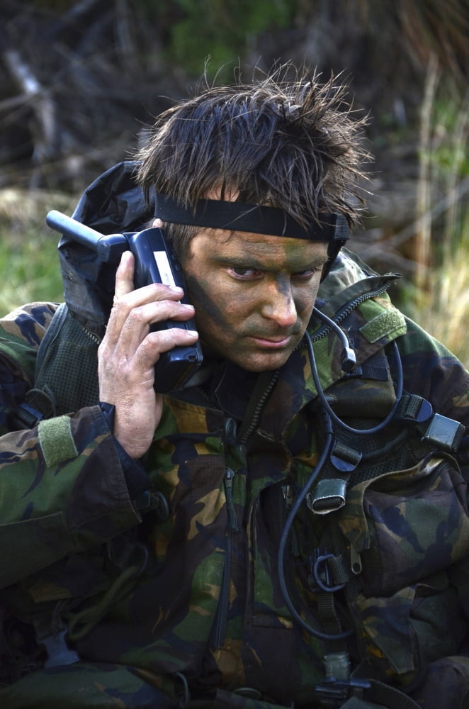 A Dutch patrol commander communicates over the radio Canvas Art - Andrew ChittockStocktrek Images (23 x 35)