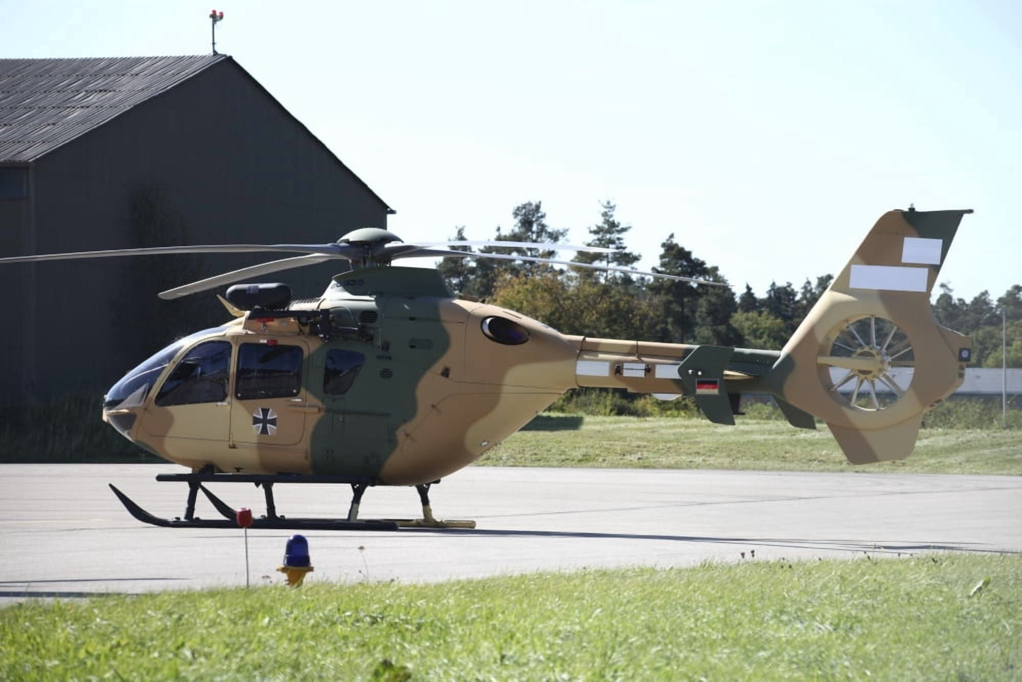 A Eurocopter EC-635 helicopter Canvas Art - Timm ZiegenthalerStocktrek Images (18 x 12)