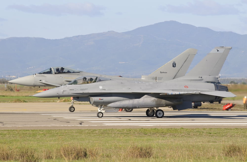 A Eurofighter 2000 Typhoon and a F-16ADF both from the Italian Air Force Canvas Art - Giovanni CollaStocktrek Images (18 x 12)