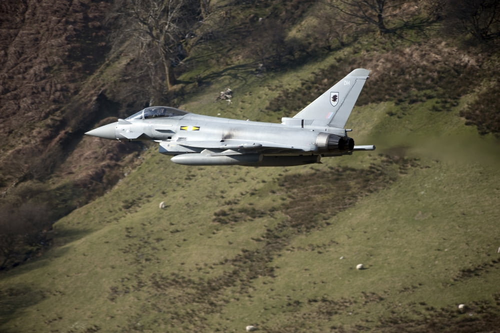 A Eurofighter Typhoon F2 aircraft of the Royal Air Force low flying in North Wales Canvas Art - Andrew ChittockStocktrek Images (34 x 23)