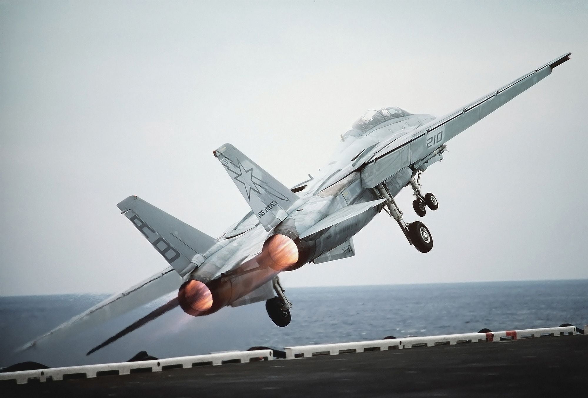 A F-14A Tomcat aircraft is launched from the nuclear-powered aircraft carrier USS Theodore Roosevelt Canvas Art - Stocktrek Images (34 x 23)