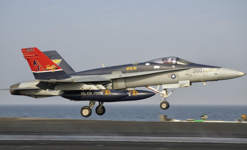 A FA-18C Hornet takes off from the flight deck of USS George HW Bush Canvas Art - Giovanni CollaStocktrek Images (18 x 11)